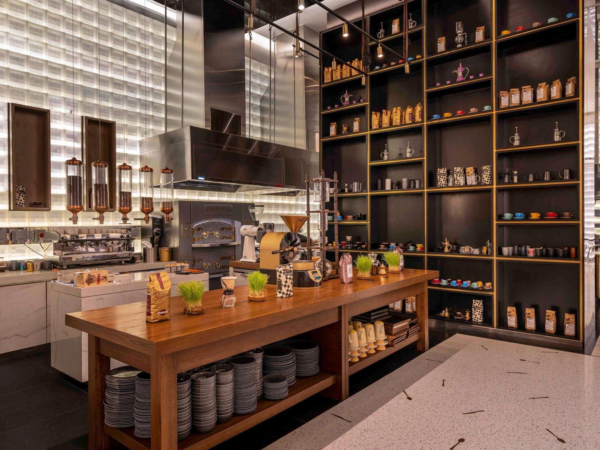 Fairmont Doha Hotel Lusail Exterior foto The R&D kitchen at the Starbucks Reserve Roastery in Seattle